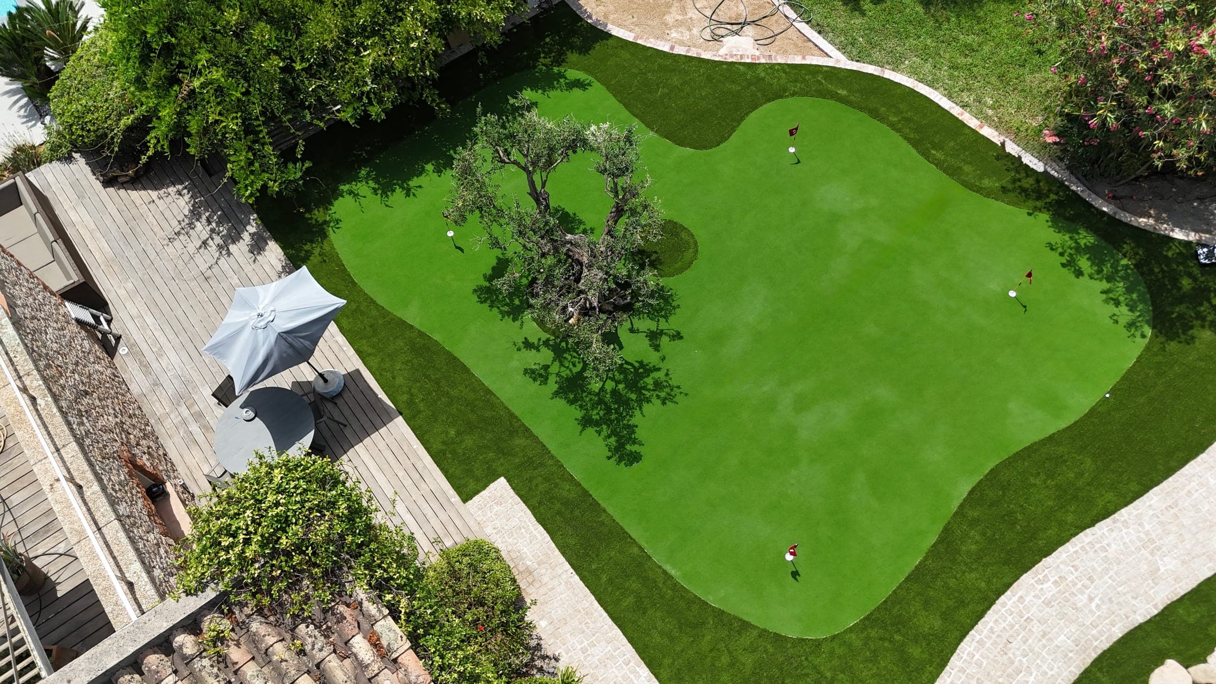 Aerial view of a Riviera Grass private putting green in Dubai
